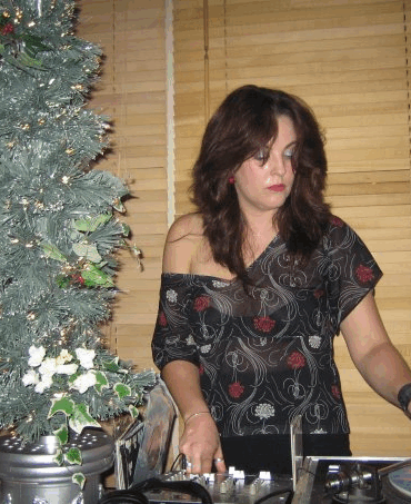Photo of Twisted Sister DJing.